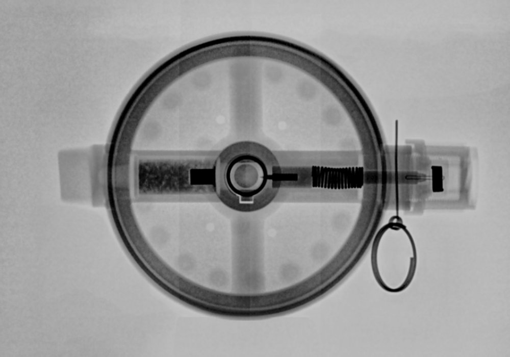 Рентгенологічний знімок міни ПМН-1 (верхня і фронтальна проєкція), автор невідомий.